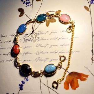 Pretty 6 stone plastic Scarab "Good vibes" goldtone Bracelet